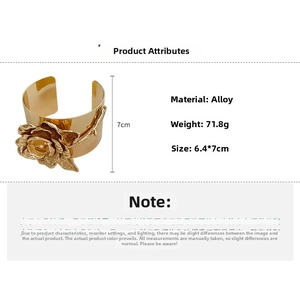 Detailed view of heavy gold rose cuff bracelet with dimensions 6.4x7cm and 71.8g weight
