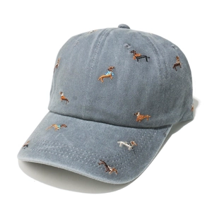 Detail of washed grey denim baseball cap with colorful dachshund dog embroidery patterns