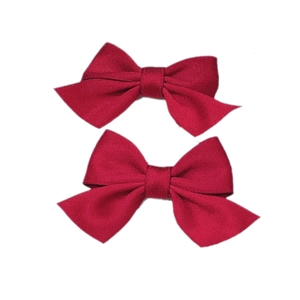 Coppia di fiocchi per capelli in tessuto rosso scuro per bambine con trama twill