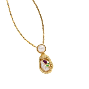 Exquisite gold necklace with flower charm and elegant pearls on white background