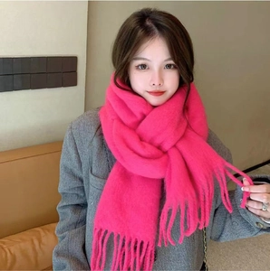 Soft rose pink mohair scarf for women featuring cozy plush texture and long tassel details