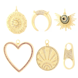 Set of 6 gold plated religious charms with moon heart and sun zodiac patterns