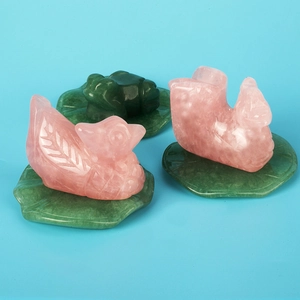 Natural rose quartz mandarin duck figurines on green lotus leaves Chinese jade decor