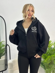 Women's black zip-up hoodie featuring white Bonne Mee athletic print and adjustable drawstrings