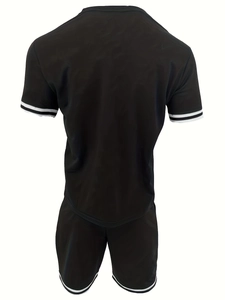 Rear view of black sportswear set with white stripes on short sleeves and shorts hem