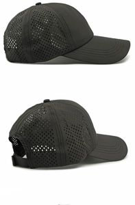 Detail of black baseball cap with laser-cut side vents for breathable outdoor wear
