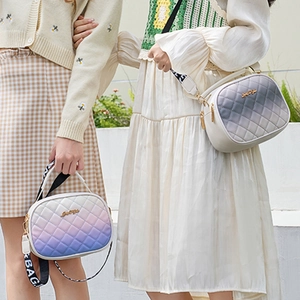 Rainbow gradient quilted crossbody bag with wide logo strap and gold hardware