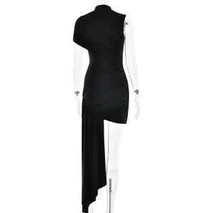Detail view of the back of a black bodycon dress with ruching and asymmetrical streamer