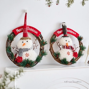 Christmas snowman rattan wreath 2-piece set with Merry Christmas sign on white mantel