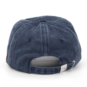Detail of blue washed cotton baseball cap with adjustable metal strap and vintage style