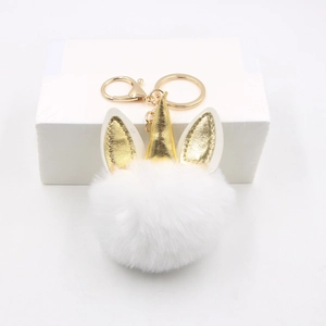 Porte-clés licorne en peluche blanche avec corne dorée et fermoir mousqueton