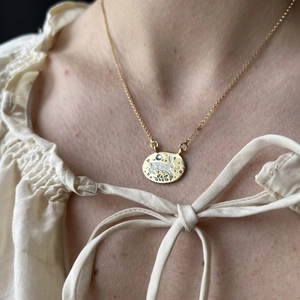 Retro tarot rabbit necklace in 18K gold plated steel with colorful gems on model