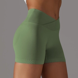 Pantaloncini yoga senza cuciture a vita alta incrociata verde erba push-up
