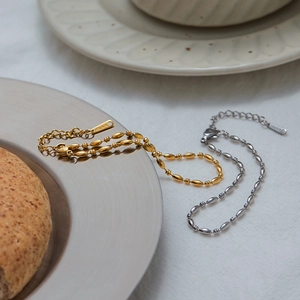 Minimalist stainless steel olive bead chain bracelet in gold and silver finish