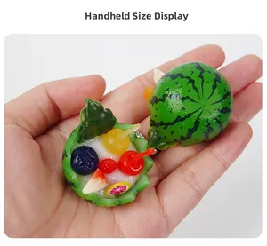 Macro view of miniature watermelon fruit bowl keychain showing realistic resin details