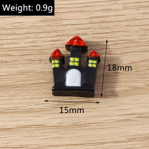Detail showing cartoon Halloween castle charm dimensions of 18mm by 15mm in size
