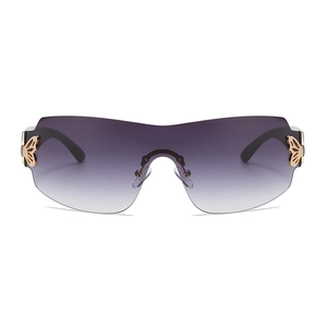 Oversized rimless shield sunglasses for women with gradient grey lenses and gold butterfly