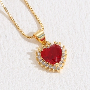 Luxurious 14K gold plated heart necklace with a large red zircon and white crystals