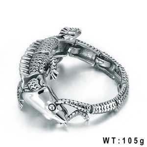 Detailed view of crocodile shaped stainless steel bracelet with fine scale textures, 105g