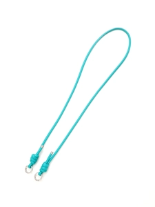 Detail of tiffany blue crossbody lanyard with silver metal rings and knotted ends