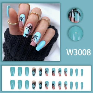 Blue and pink summer island press-on nails with palm tree silhouette and coffin shape