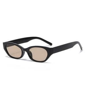 2025 Trendy cat-eye sunglasses with black frame and translucent tea lenses for women