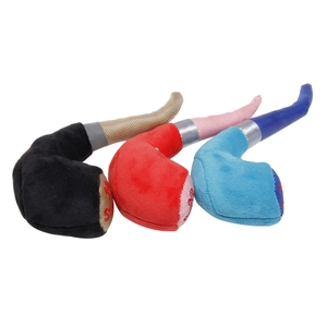 Detailed view of three plush pipe-shaped dog toys in black, red and blue fabric