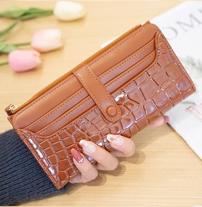 Detailed view of brown stone pattern long wallet with multiple card slots and zipper closure