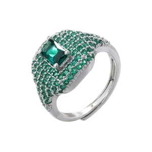 Detail of square emerald-cut green gem ring with sparkling micro-pave crystals