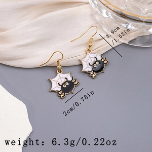 Detail view of spider web earrings with size dimensions 3.9cm by 2cm and weight 6.3g