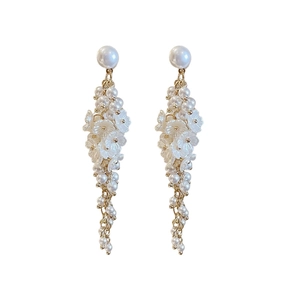 Elegant floral pearl tassel earrings with gold-tone accents on a clean white backdrop