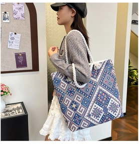 Ethnic pattern tote bag with woven diamond motifs and thick twisted white rope handle