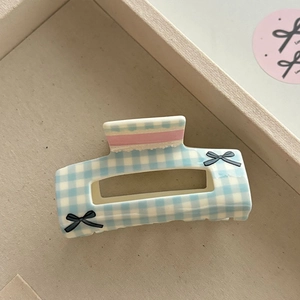 Blue plaid hair claw clip with pink stripes and small black bow design for women
