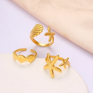 Adjustable golden stainless steel rings with starfish and seashell designs for women