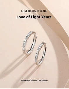Detailed macro shot of S925 sterling silver couple rings with intertwined zirconia design