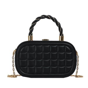 Elegant black quilted woven box bag with a golden chain strap and top handle