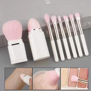 8-in-1 pearlescent makeup brush set with pink bristles and white handle for face and eyes