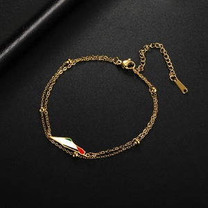 Detail view of double-layer gold beaded bracelet featuring a Palestine map flag charm