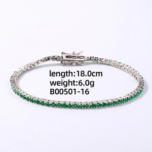 Detail of 18cm silver tennis bracelet with round green zircons and secure clasp