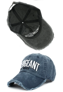 Detail of distressed washed cotton baseball cap with Sergeant Pepper 3D embroidery