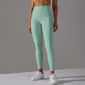 Détail du pantalon de yoga vert menthe taille haute avec ceinture sans couture respirante