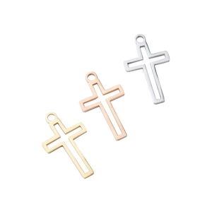 Detailed view of hollow cross pendants in gold, rose gold, and silver finishes