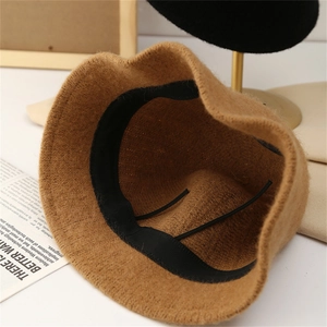 Detail of adjustable inner drawstring and black sweatband inside the wool bucket hat