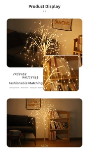 Close-up of warm LED lighted birch tree decor with white branches for home atmosphere