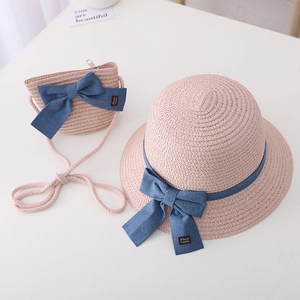Pink straw hat and matching purse set with blue denim bow for girls' beach sun protection