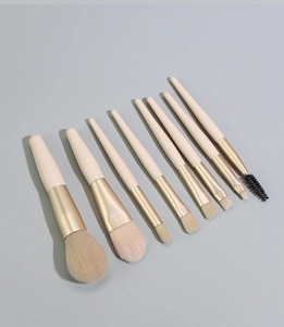 8 pieces mini makeup brush set with beige handle for powder eyeshadow and highlighting.