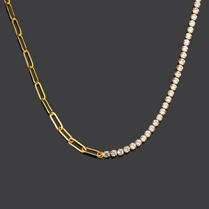 Modern gold paperclip chain and white zircon tennis necklace set on black background
