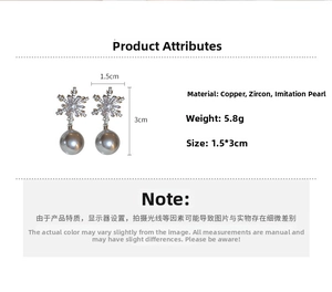 Detail showing dimensions and 5.8g weight of snowflake earrings with faux pearls