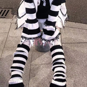 White striped JK leg warmers with black lace trim and skull pattern for Lolita style