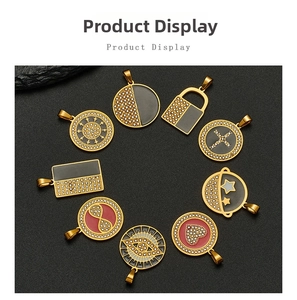 Macro view of gold-plated hip hop pendants featuring evil eye, cross and star designs